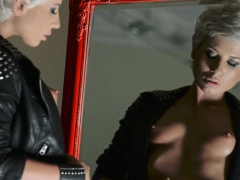 Tiffany looks hot and dangerous in her studded leather.