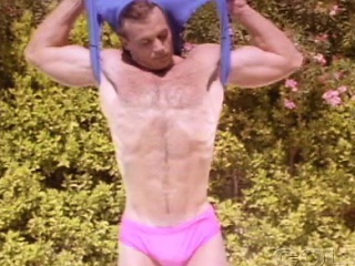 Vintage clip of john pruitt exercising and showering
