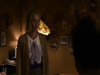 Charlize theron undressing down to her underwear, revealing...