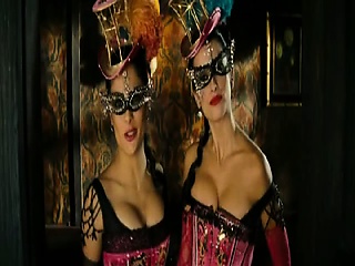 Salma Hayek And Penelope Cruz Wearing Showgirl Outfits That...