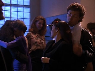 Drew barrymore  she leans against a...