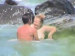 Couple having sex at the sea
