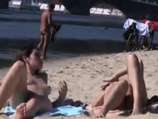Naked Teen Girls Tanning At A Beach...