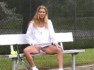 Beautiful tennis player flashing in public