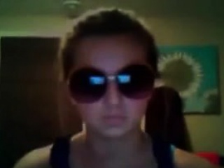  Teen Wearing Sunglasses...