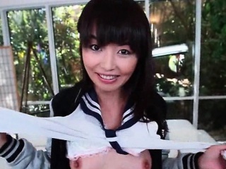 Little asian school doll plays with her nipples