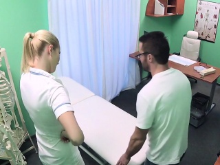 Handyman fucks nurse on exam table...