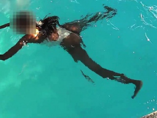 Bright Bikini In Swimming That Is Public...