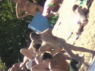 The family that sunbathes in the nude together, stays toget
