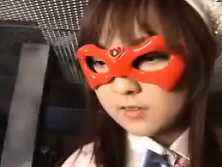 Young Asian Heroine In An Orange Mask Is Taken Down In A Fi...