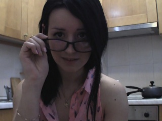 Splendid Teen With Glasses Chatting In The Kitchen...