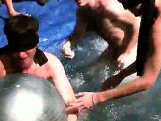 Hazing in an outdoor pool orgy...