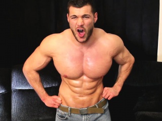 Ripped muscle man jerking off in jeans