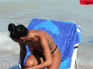 Two horny amateur topless teens - voyeur beach video