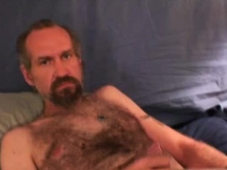 Hairy mature dude wanks off his...
