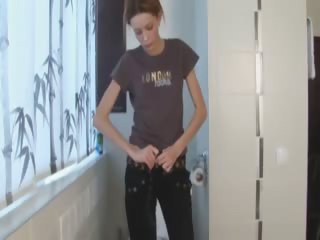 Extremely delicate skinny girl peeing