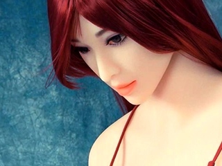 Redhead teen sex doll in bikini with huge boobs