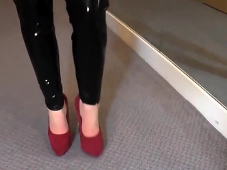 Sexy latex liquid leggings with red stilettos fetish
