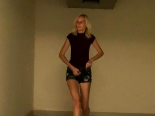 Hot blonde pisses in indoor car park