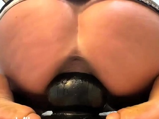 Gigantic dildo stretches her greedy hole...