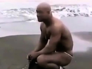 Asian Bodybuilder Barely Covered Beach...