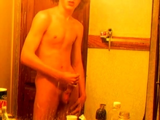 Curly haired twink in bathroom...