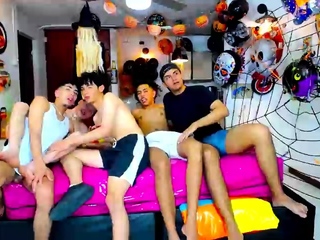 Four twinks enjoy gay group sex...