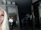 Blonde mature with big boobs masturbates in bed