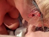 Sucking a big cock outdoors on a sunbed.