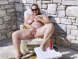 Big-Titted Milf Squirts Outdoors with Sex Toy