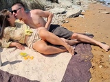 Red-hot gonzo romp on the beach with a bare woman!