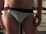 Skinny Twink Bulges Out of His Blue Speedo